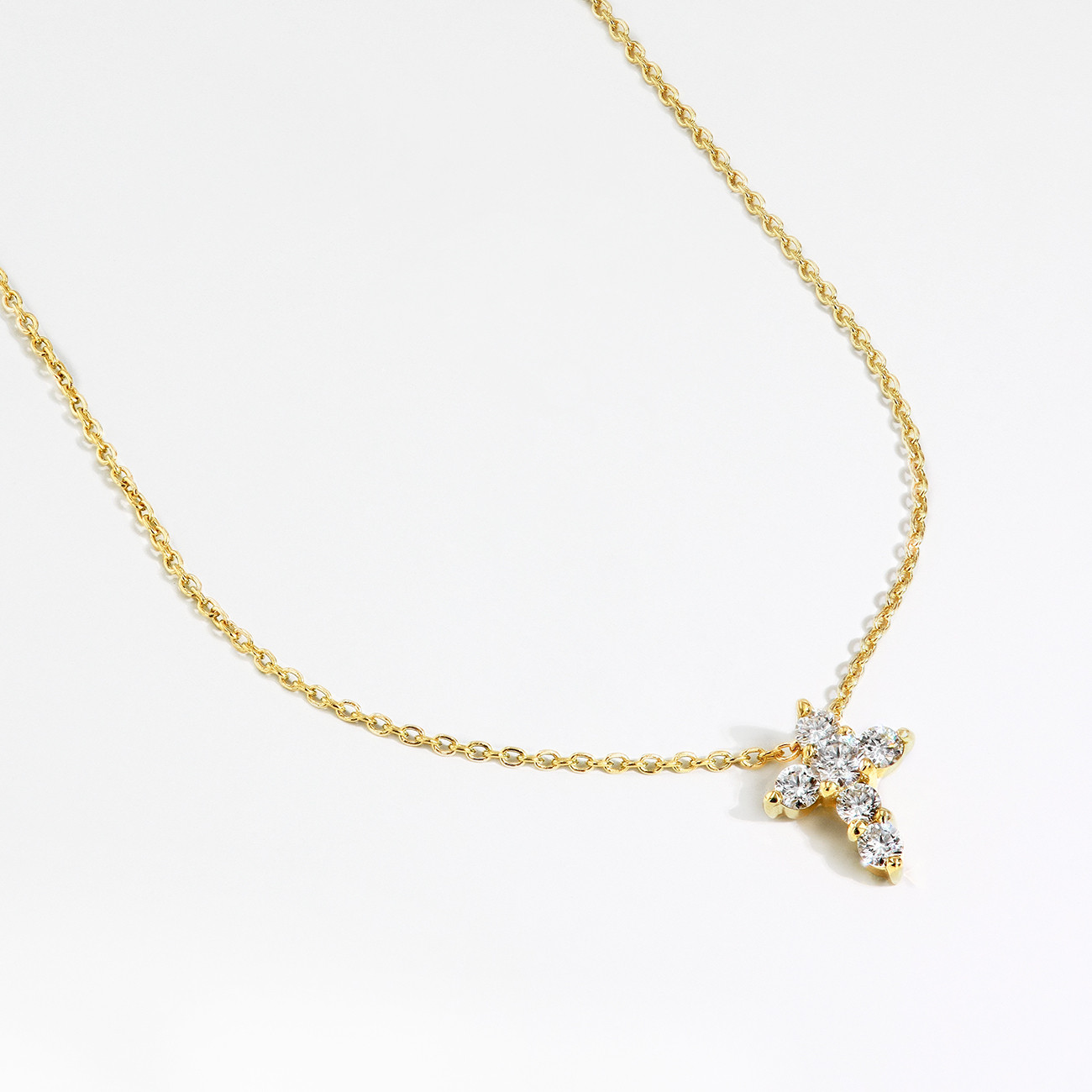 Tiny diamond store cross necklace gold